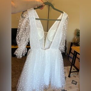 LuLus Dress. -White with cuffed forearm length sleeves